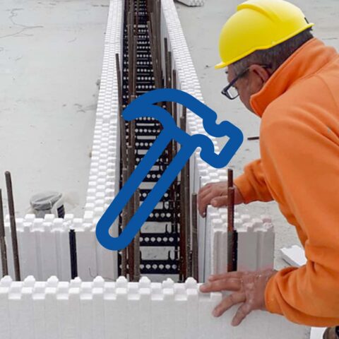 Worker using ICF formwork